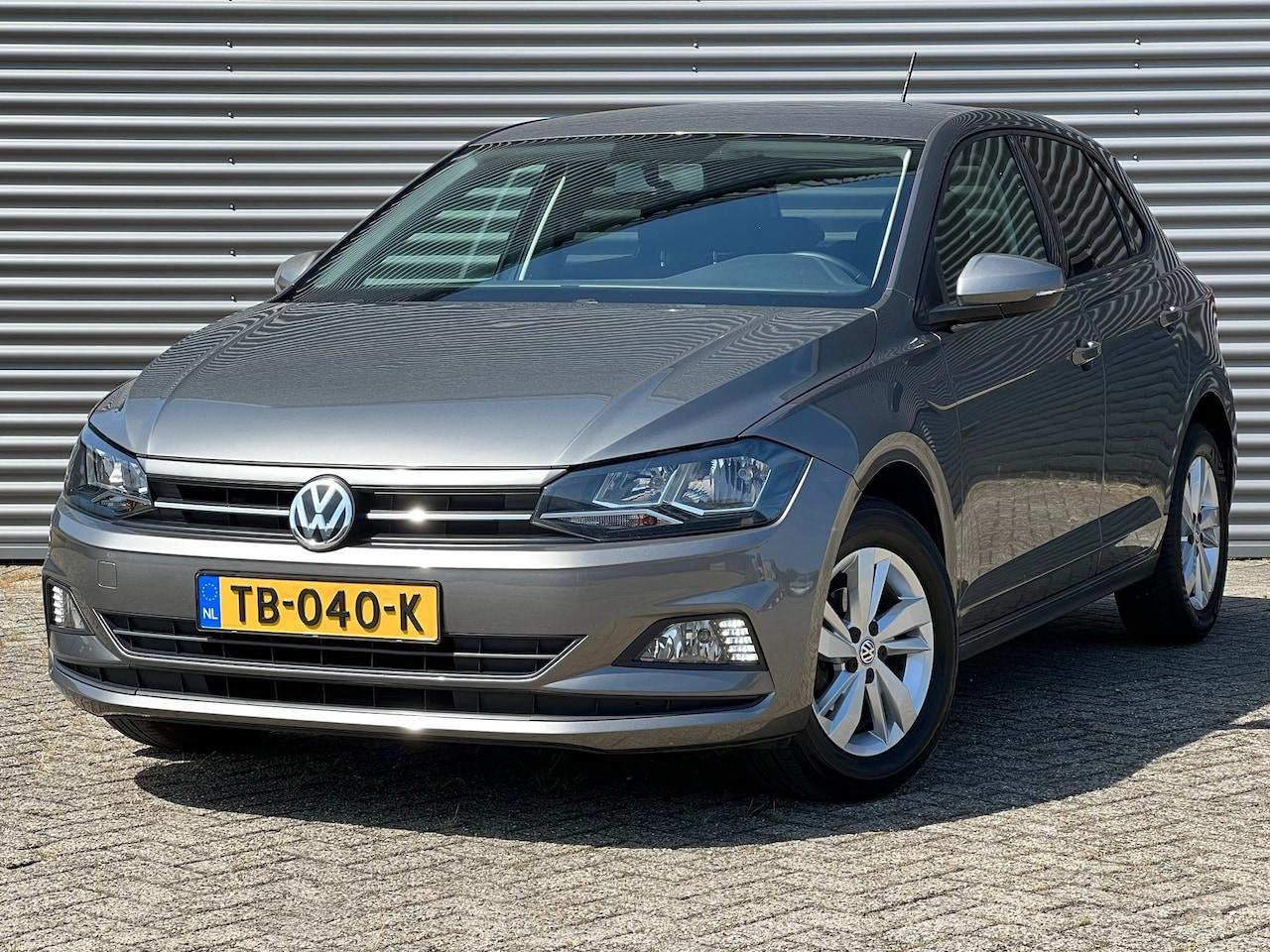 Volkswagen Polo - 1.0 TSI Comfortline 95 PK | Navigatie | Apple Carplay | 15" LM | NL-Auto | Parkeersensoren - AutoWereld.nl