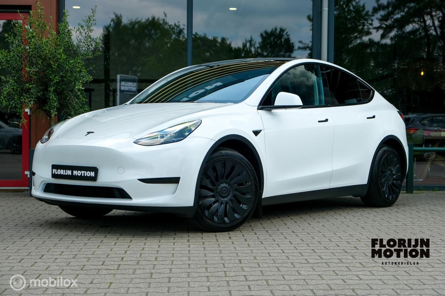 Tesla Model Y - RWD 58 kWh | Autopilot 3.0 Ryzen | Stoel en stuurwielverw. | 1e eigenaar | Premium interie - AutoWereld.nl