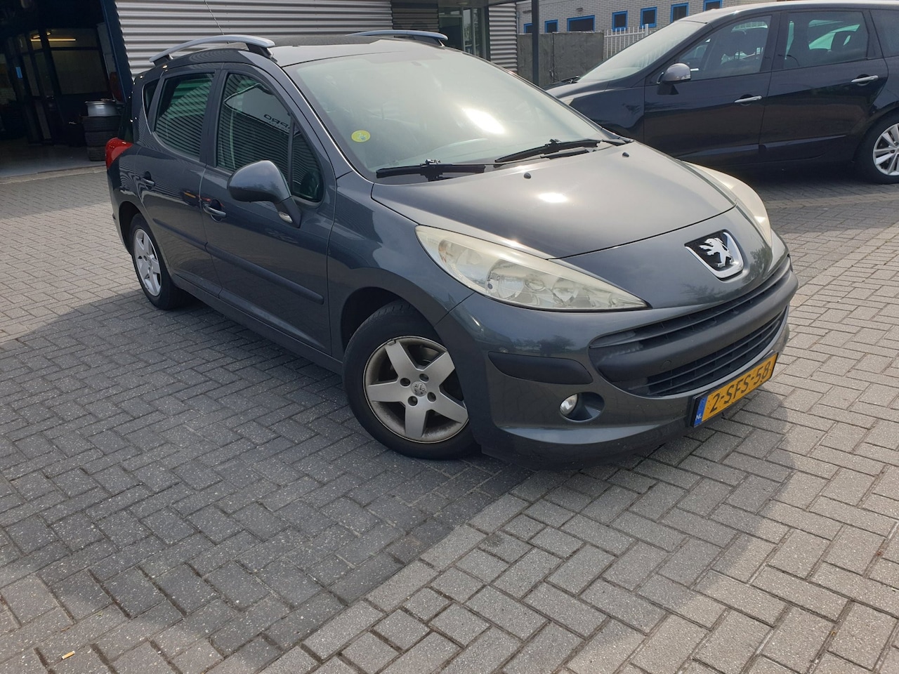 Peugeot 207 SW - 1.4 VTi X-line 1.4 VTi X-line - AutoWereld.nl