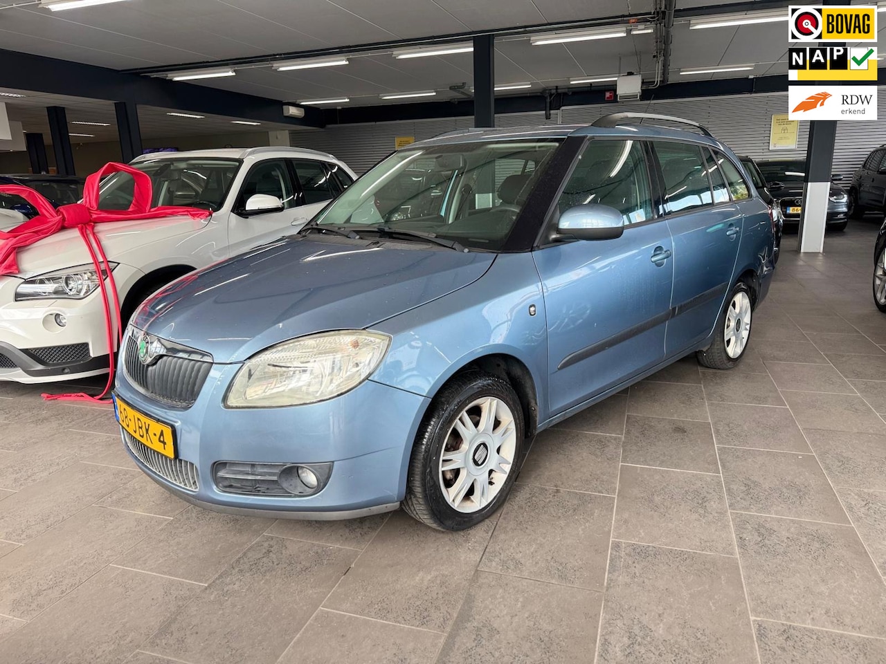 Skoda Fabia Combi - 1.4-16V Ambiente airco cruise controle lm-velgen elektrische pakket parkeersensoren trekha - AutoWereld.nl