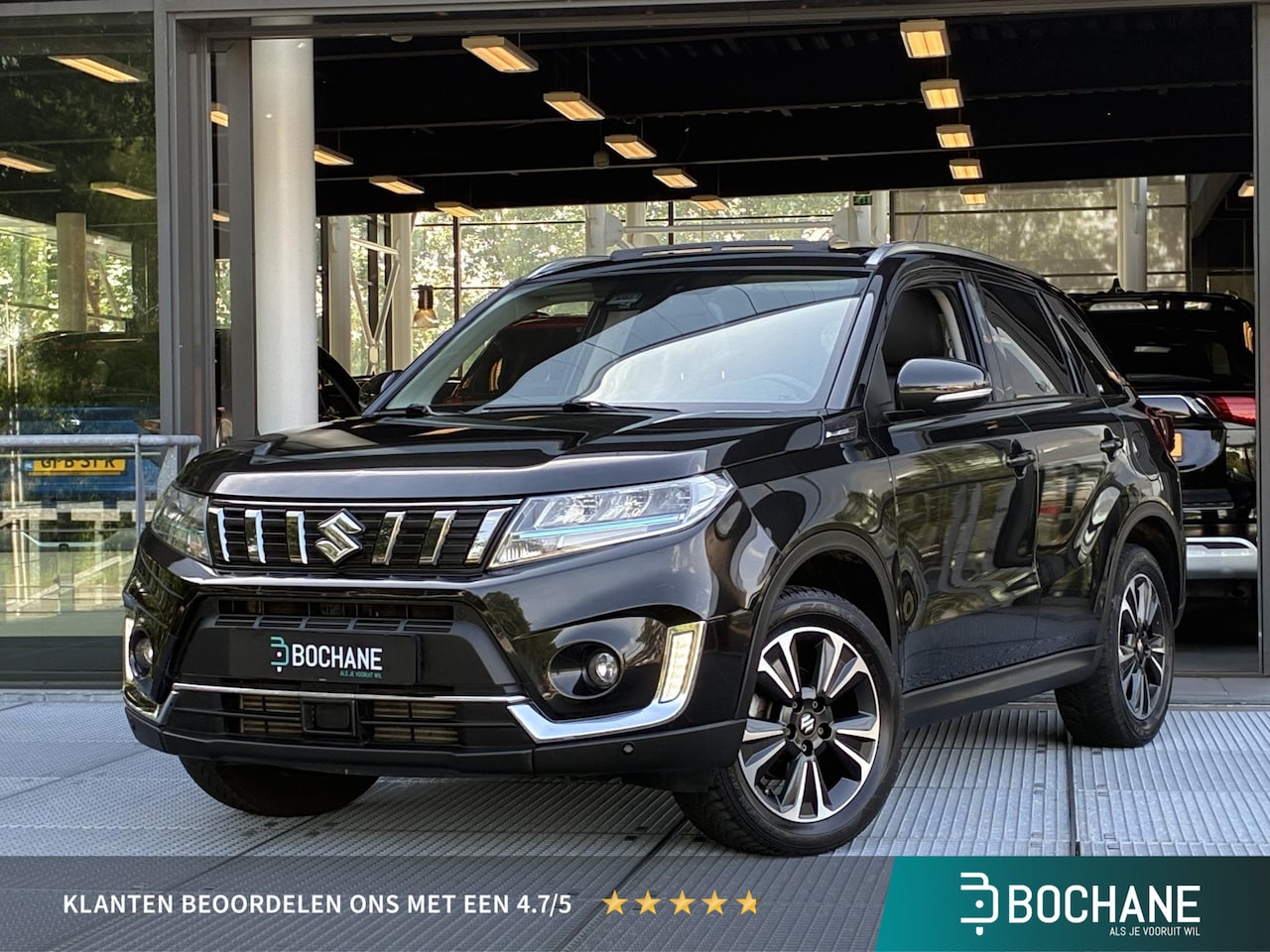 Suzuki Vitara - 1.4 Boosterjet Style Smart Hybrid 129PK | Panoramadak | Half-leder | Navigatie | Climate C - AutoWereld.nl