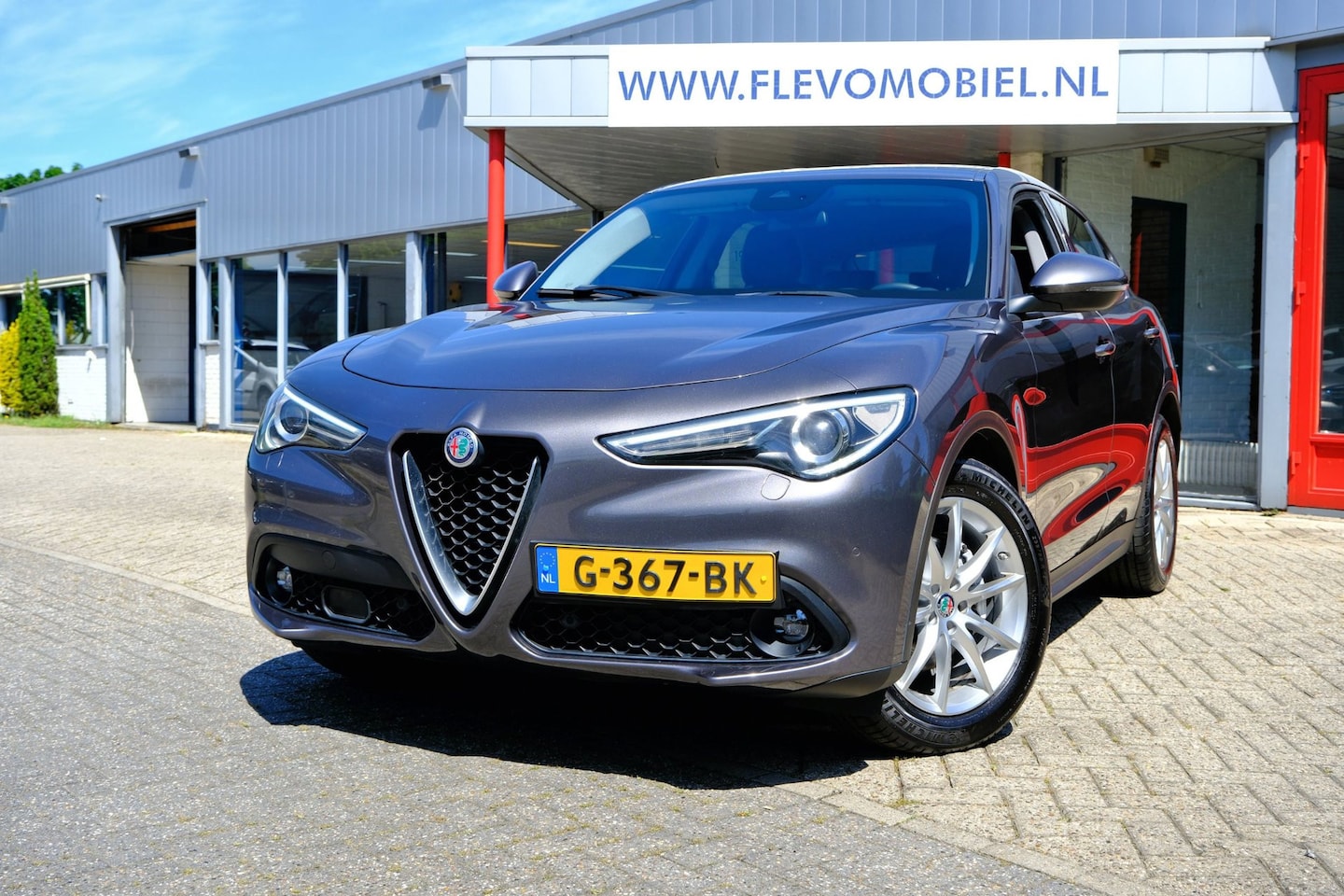 Alfa Romeo Stelvio - 2.2d 180pk Super Aut. Xenon|Clima|Navi|DAB+|Half Leder - AutoWereld.nl