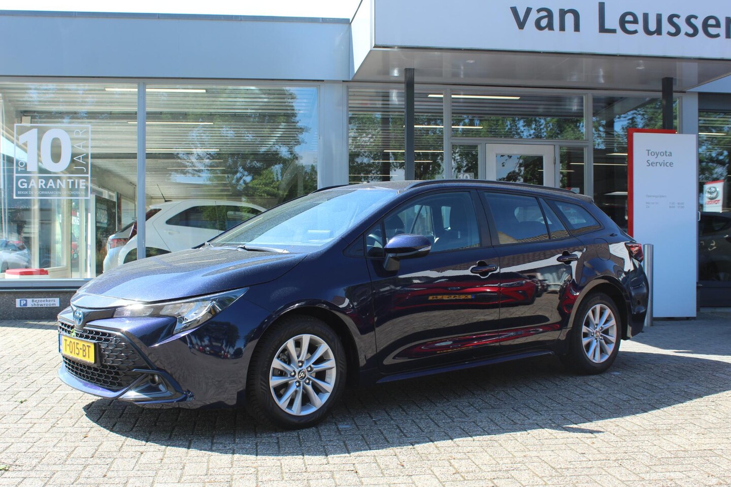 Toyota Corolla Touring Sports - Hybrid 140 ALL SEASONS NL-AUTO APPLE/ANDROID CLIMA LM-VELGEN BLUETOOTH AD-CRUISE CAMERA DA - AutoWereld.nl