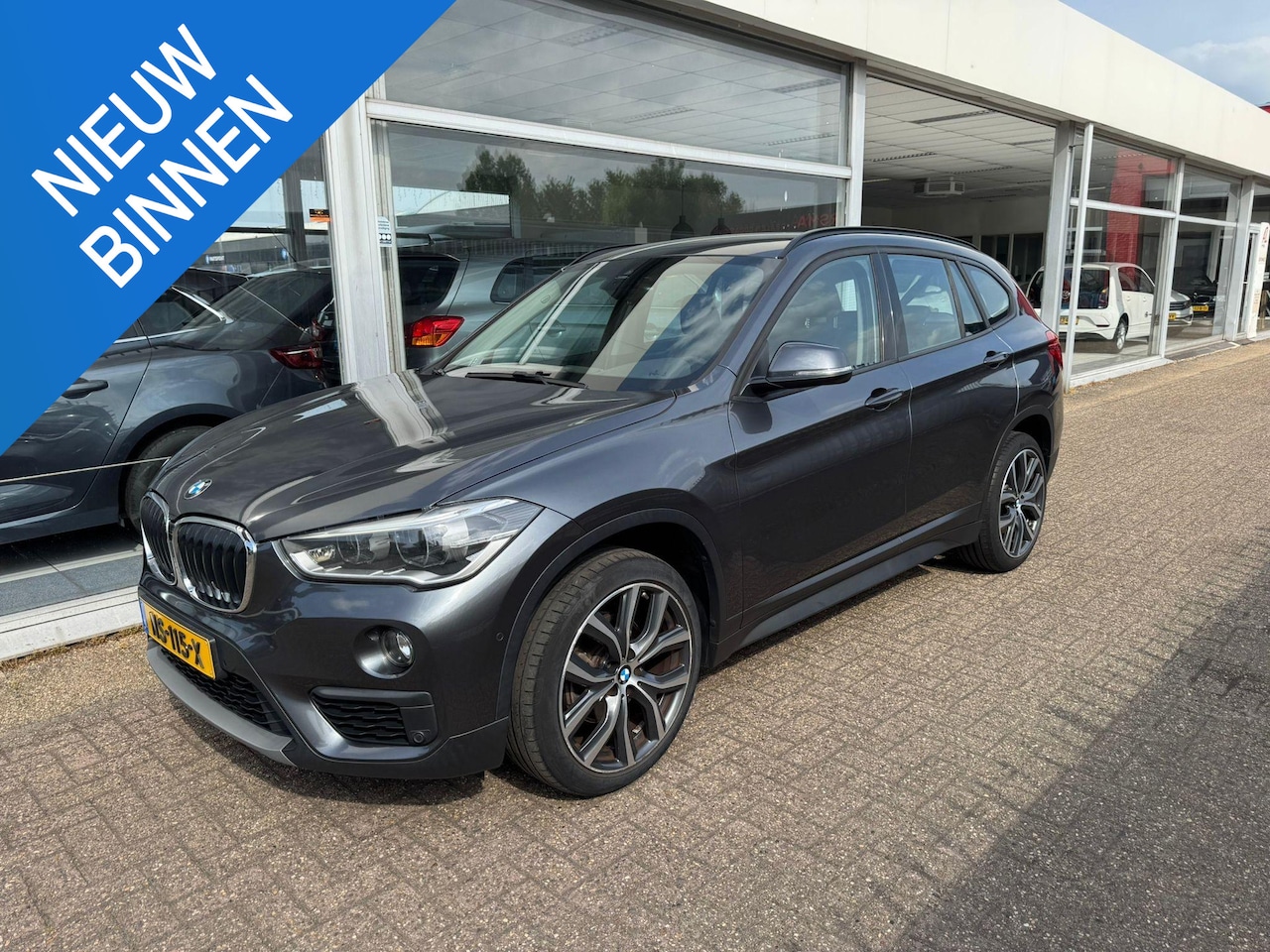 BMW X1 - sDrive18i High Executive | 1e eigenaar | Automaat | Afneembare trekhaak | Airco | Elektris - AutoWereld.nl