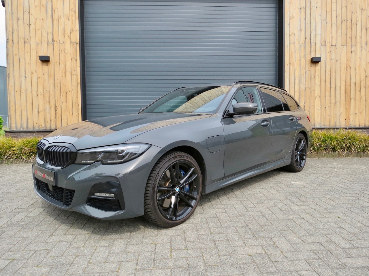 BMW 3-serie Touring - 330e High Executive *M sport *Pano *HK - AutoWereld.nl