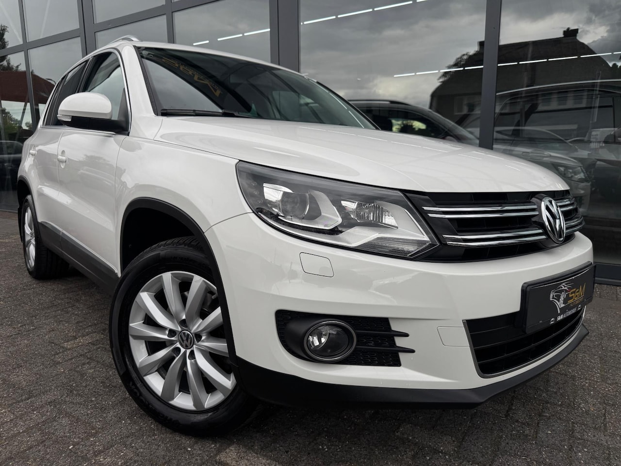 Volkswagen Tiguan - 2.0 TSI Sport&Style 4Motion | Pano. - AutoWereld.nl