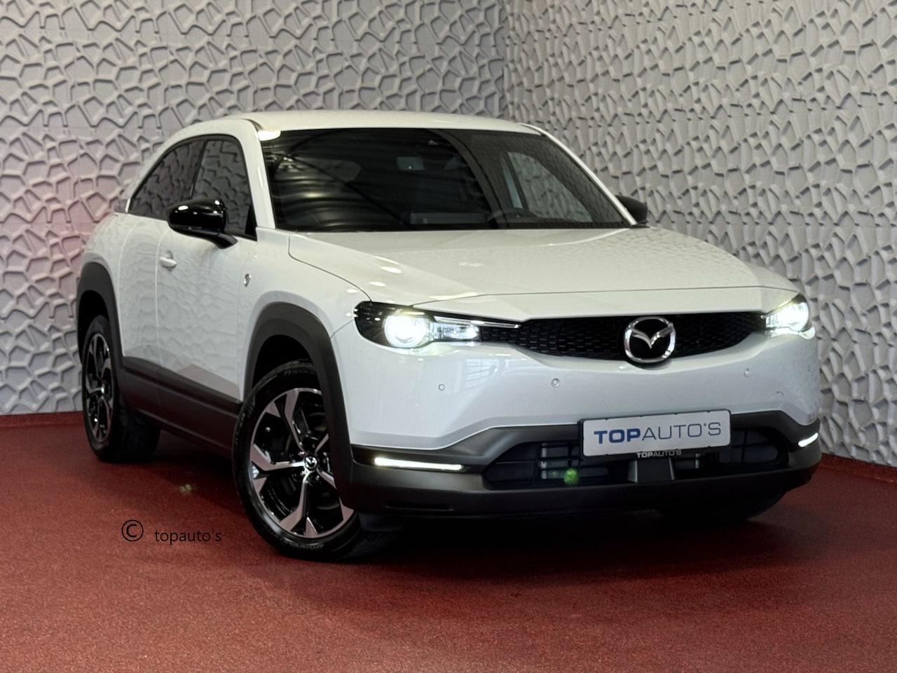 Mazda MX-30 - E-SKYACTIV R-EV PHEV BOSE 170PK ELEK.STOEL H.U.D CAMERA LED PLUG IN HYBRID  phev plugin - AutoWereld.nl