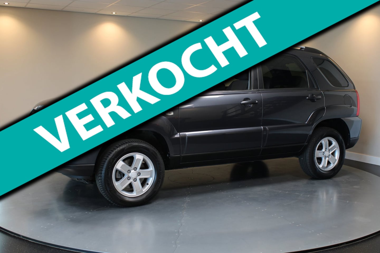 Kia Sportage - 2.0 CVVT X-ecutive *2de Eigenaar* Top onderhouden! Trekhaak|Cruise|Climate|Navi|NAP - AutoWereld.nl