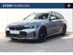 BMW 3-serie Touring - 330e M Sport Automaat / Trekhaak / Panoramadak / Sportstoelen / Comfort Access / Adaptieve