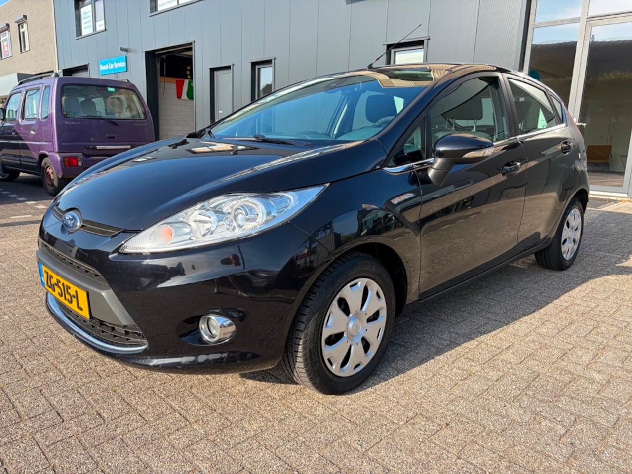 Ford Fiesta - 1.4 Ghia 1.4 Ghia, Stoelverw. Clima, Bluetooth - AutoWereld.nl