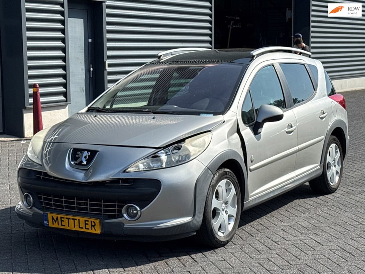 Peugeot 207 SW Outdoor - 1.6 VTi XS | airco | panoramadak | trekhaak | cruise control - AutoWereld.nl