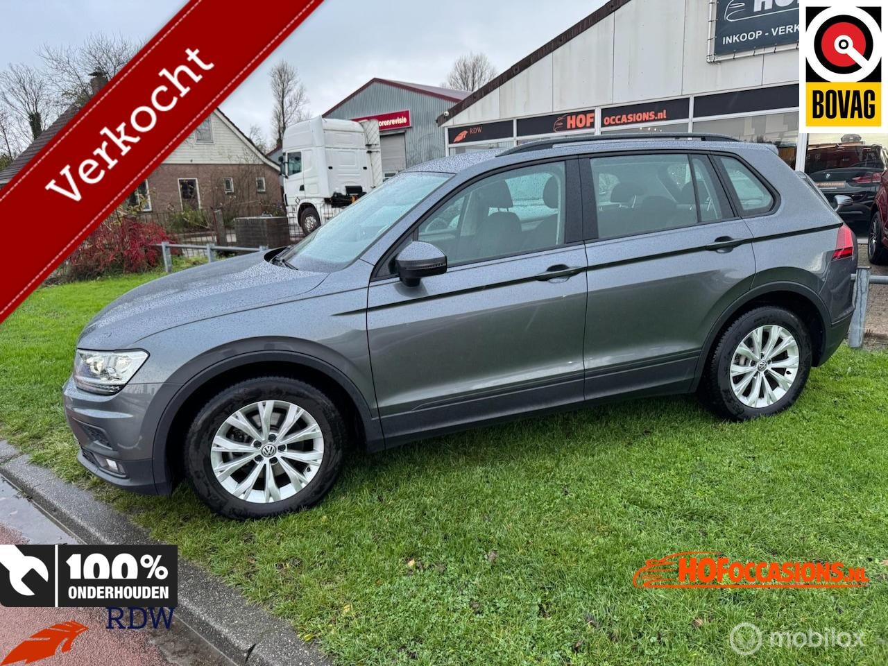 Volkswagen Tiguan - 1.5 TSI Comfortline 150pk NAVI/PDC/STOELVERW./ADAPT.CRUISE - AutoWereld.nl
