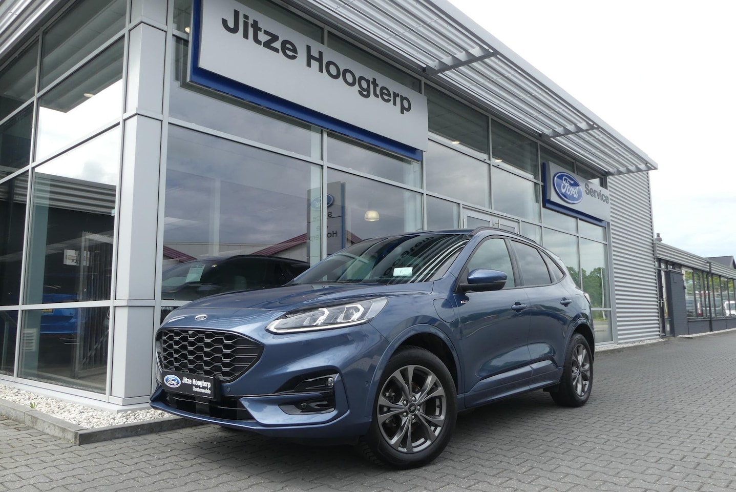 Ford Kuga - 2.5 PHEV ST-Line X ELEKT. TREKHAAK (1.500KG), HUD, WINTER PACK, ADAPT. CRUISE, CLIMA, NAVI - AutoWereld.nl