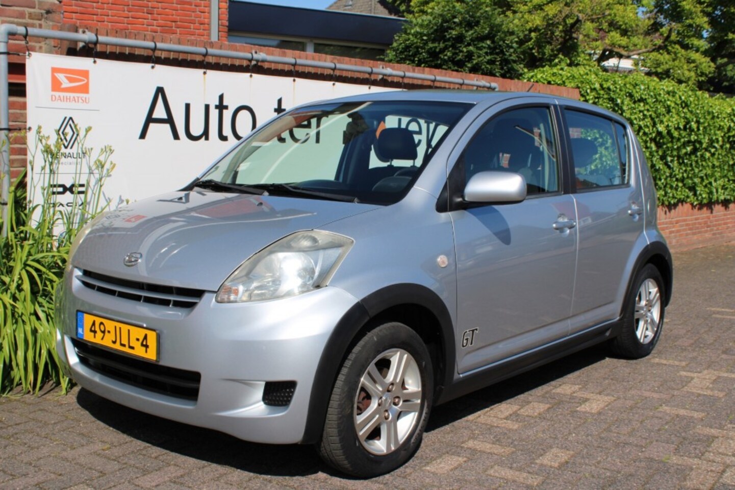 Daihatsu Sirion - 1.0 12V Premium GT  van 1e eigenaar - AutoWereld.nl