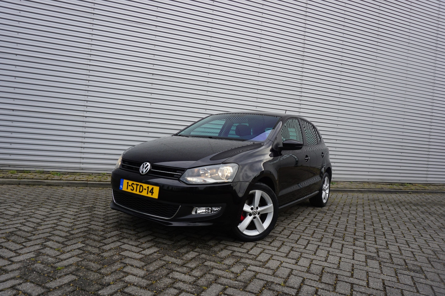 Volkswagen Polo - 1.2 TSI BlueMotion Highline Climate / Navi / Cruise / Parkeers. / Lm velgen / NAP - AutoWereld.nl