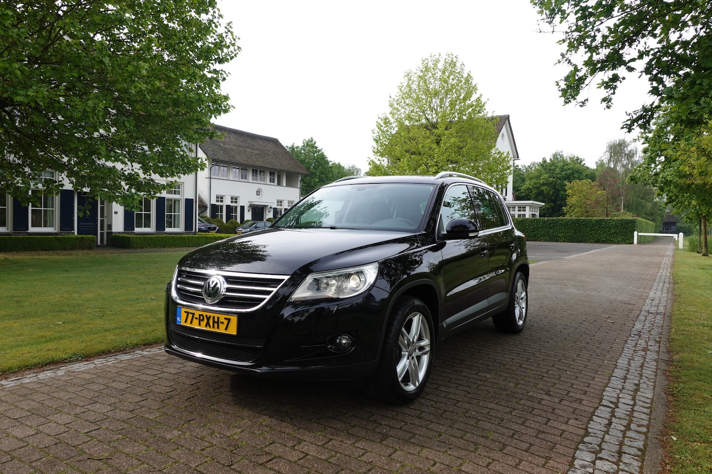 Volkswagen Tiguan - 1.4 TSI Sport&Style | NIEUWE KETTING | Trekhaak | NAVI | Xenon | - AutoWereld.nl