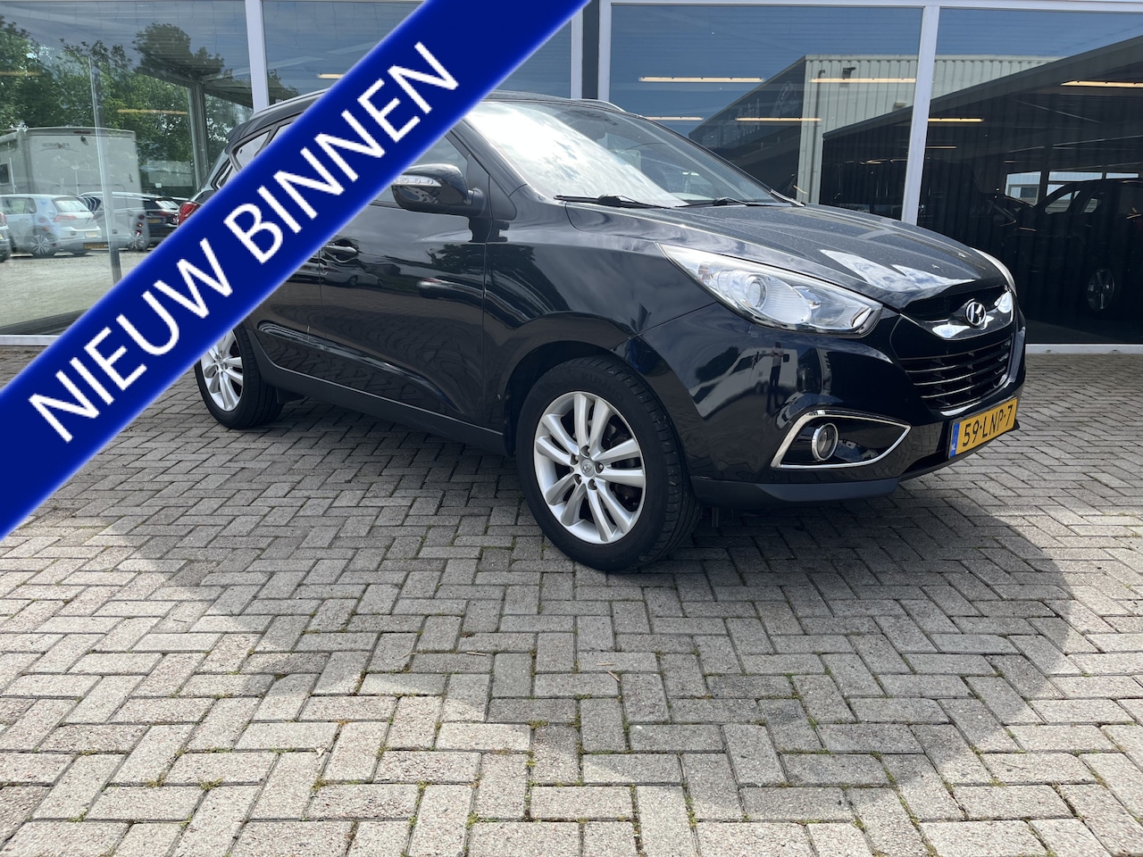 Hyundai ix35 - 2.0i i-Catcher Leer / Schuif-kantel dak / Trekhaak / Lmv / Stoelverwarming - AutoWereld.nl
