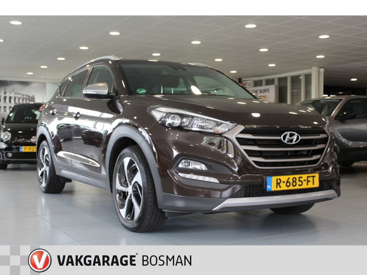 Hyundai Tucson - 1.6 T-GDi Comf. 4WD/CAMERA/CRUISE/TREKHAAK - AutoWereld.nl