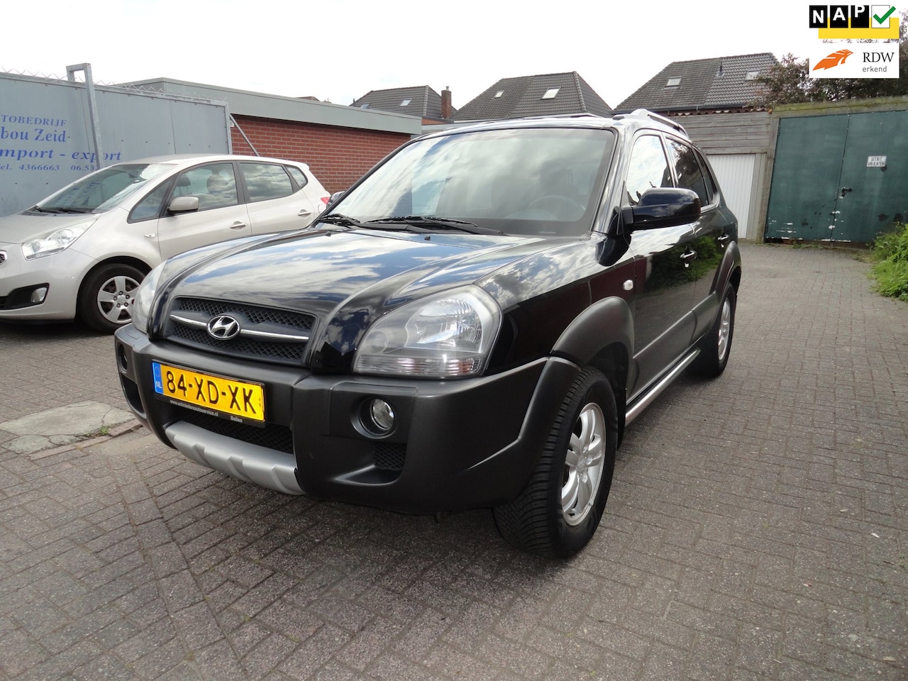Hyundai Tucson - 2.0i Dynamic Cross 2.0i Dynamic Cross (KM 172535 NAP AIRCO) NIEUWSTAAT - AutoWereld.nl