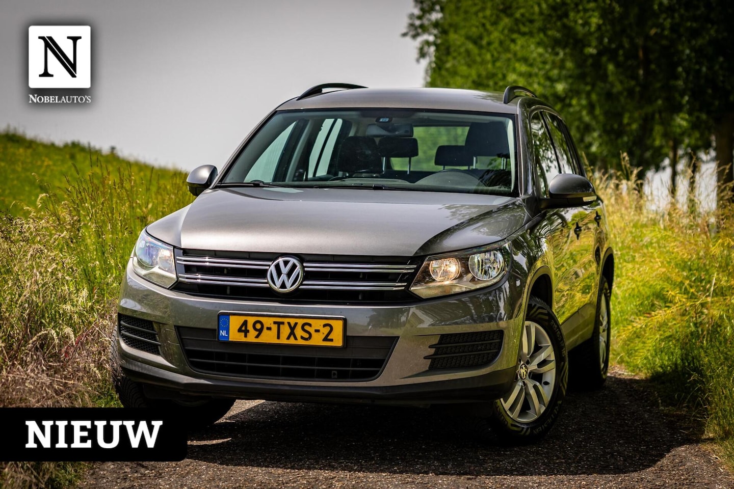 Volkswagen Tiguan - 1.4 TSI Sport&Style |Nap |Trekhaak |Dealer - AutoWereld.nl