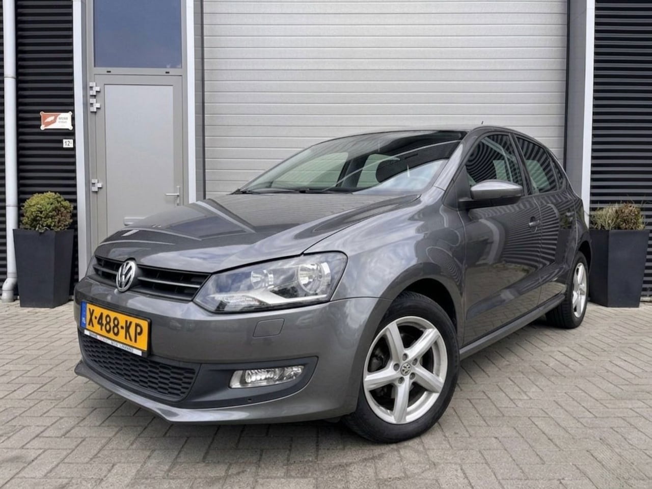 Volkswagen Polo - 1.2-12V Trendline/Cruise control/Navi/Multimedia/PDC achter/Clima/ - AutoWereld.nl
