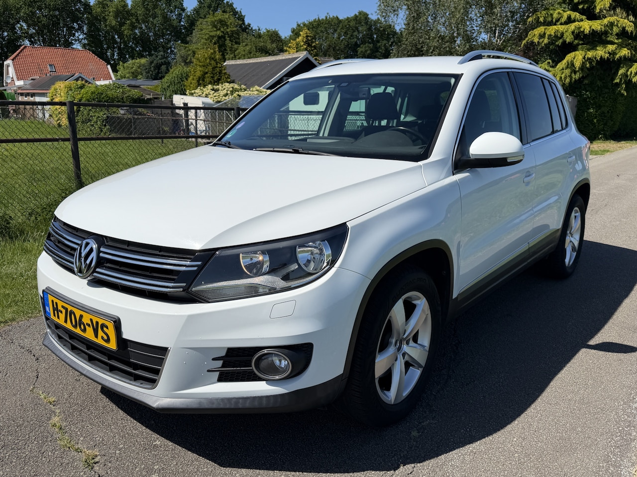 Volkswagen Tiguan - 1.4 TSI Sport&Style NAVI/ECC/CRUISE/STOELVERW - AutoWereld.nl
