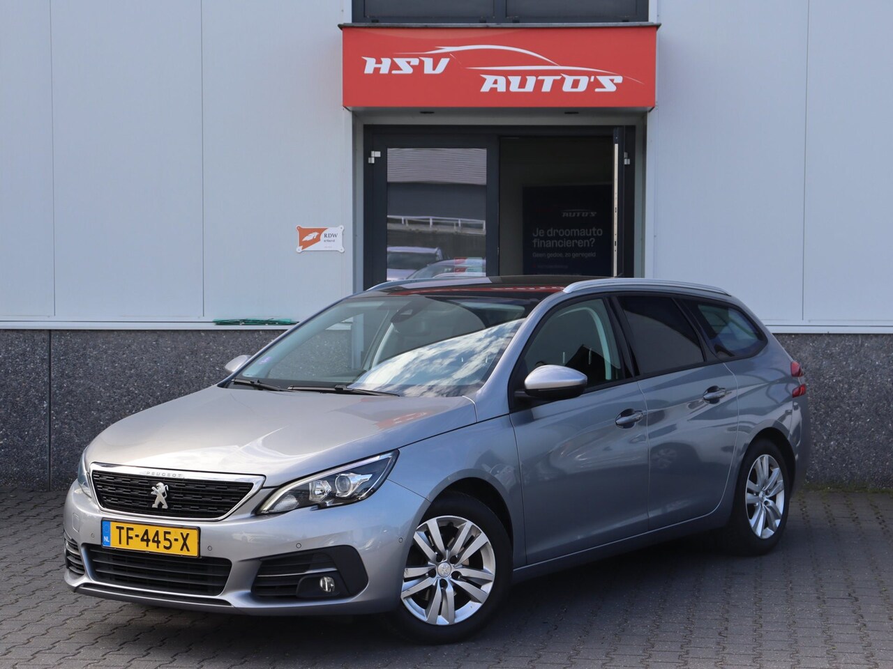Peugeot 308 SW - 1.2 PureTech Blue Lease Executive org NL - AutoWereld.nl