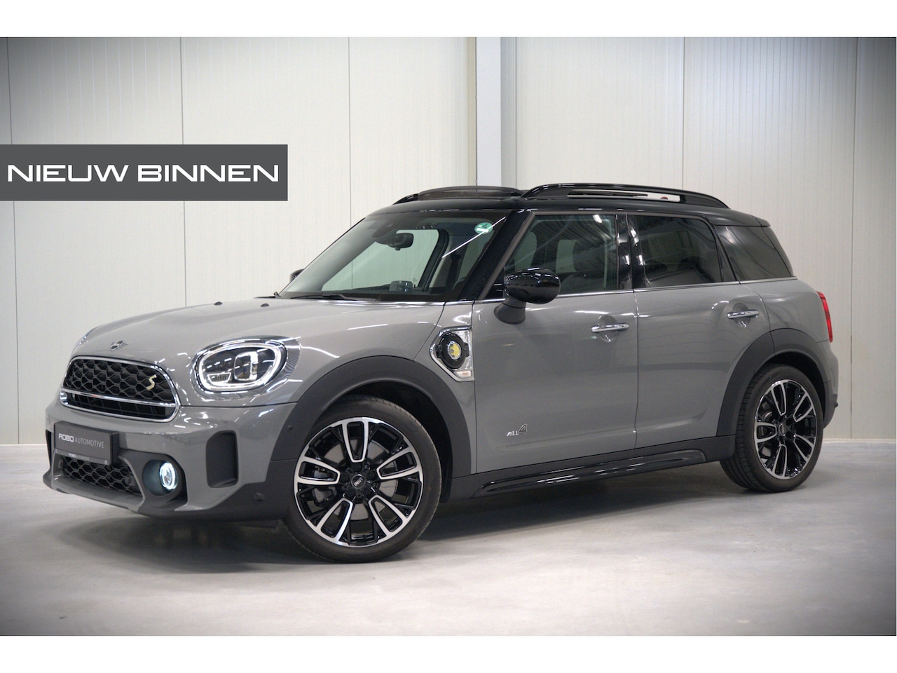 MINI Countryman - 1.5 Cooper S E ALL4 Chili | Panoramadak | Stoelverwarming | Stuurverwarming | Head-Up Disp - AutoWereld.nl