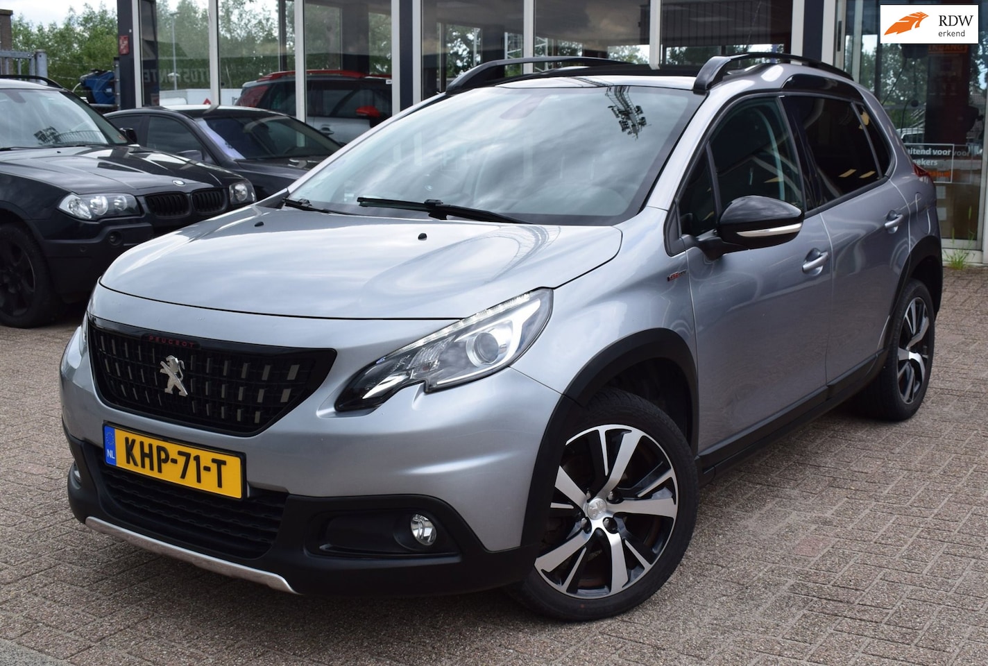 Peugeot 2008 - 1.2 Pure Tech Allure | PANORAMADAK | NAVIGATIE | CLIMATE CONTROL |CRUISE CONTROL|HALF LEDE - AutoWereld.nl