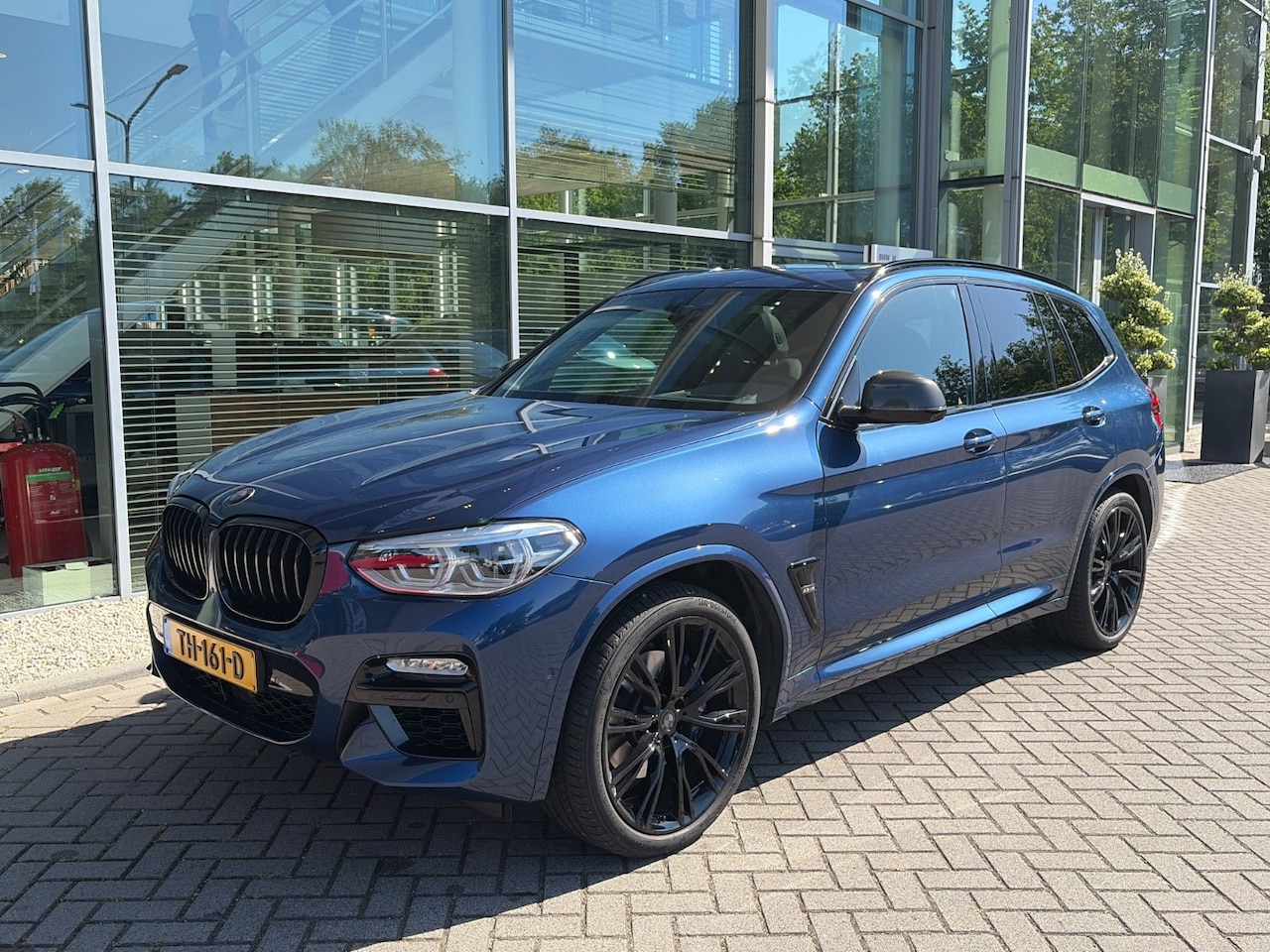 BMW X3 - M40i xDrive High Executive M-sport | panoramadak | head-up | harmankardon | adap. cruise | - AutoWereld.nl