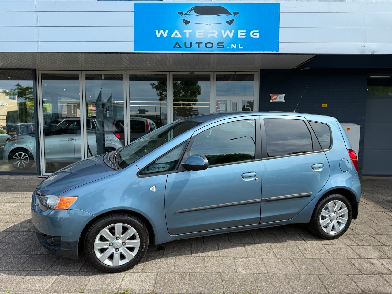 Mitsubishi Colt - 1.3 Edition Two NAP|AUTOMAAT|AIRCO/lage km stand - AutoWereld.nl