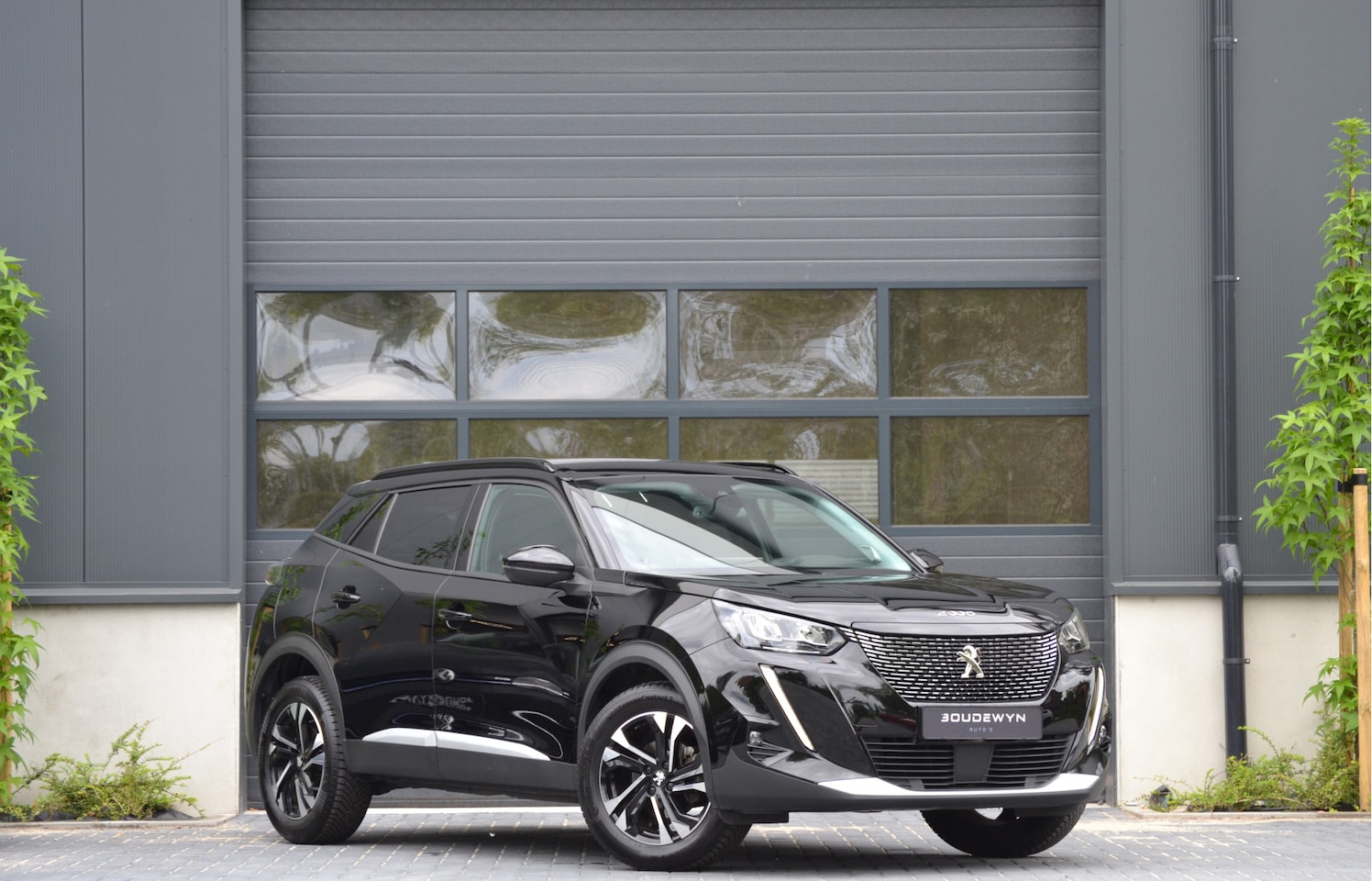 Peugeot 2008 - 1.2 PureTech Allure Pack Camera | Carplay | Automaat | half/leder - AutoWereld.nl
