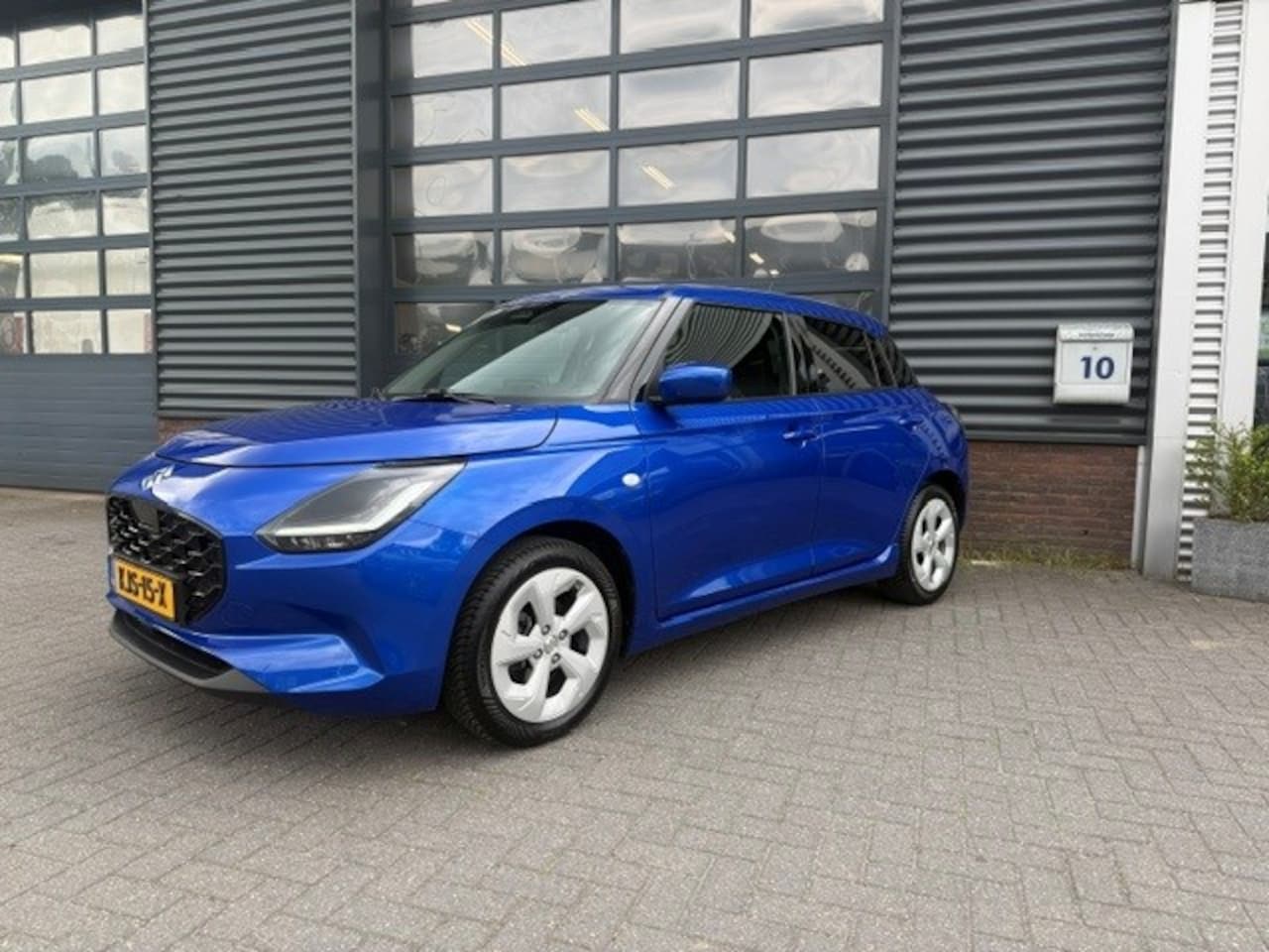 Suzuki Swift - 1.2 Select Smart Hybrid Carplay Camera PDC Stoelverw. - AutoWereld.nl