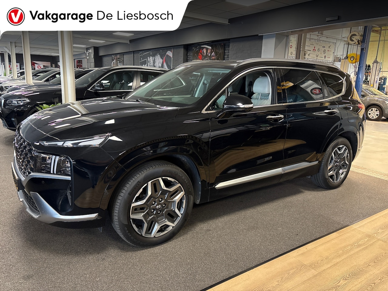 Hyundai Santa Fe - 1.6 T-GDI PHEV 4wd Premium 7p SOH100% /navi / leer / Krell audio / head up / stoel koeling - AutoWereld.nl