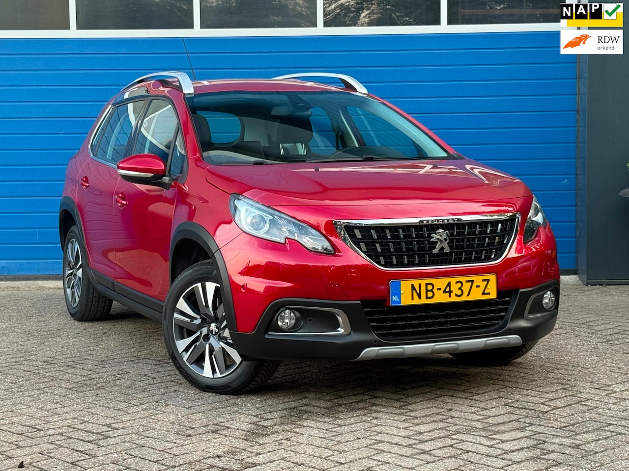 Peugeot 2008 - 1.2 PureTech Allure Automaat|Navi.|Climate - AutoWereld.nl