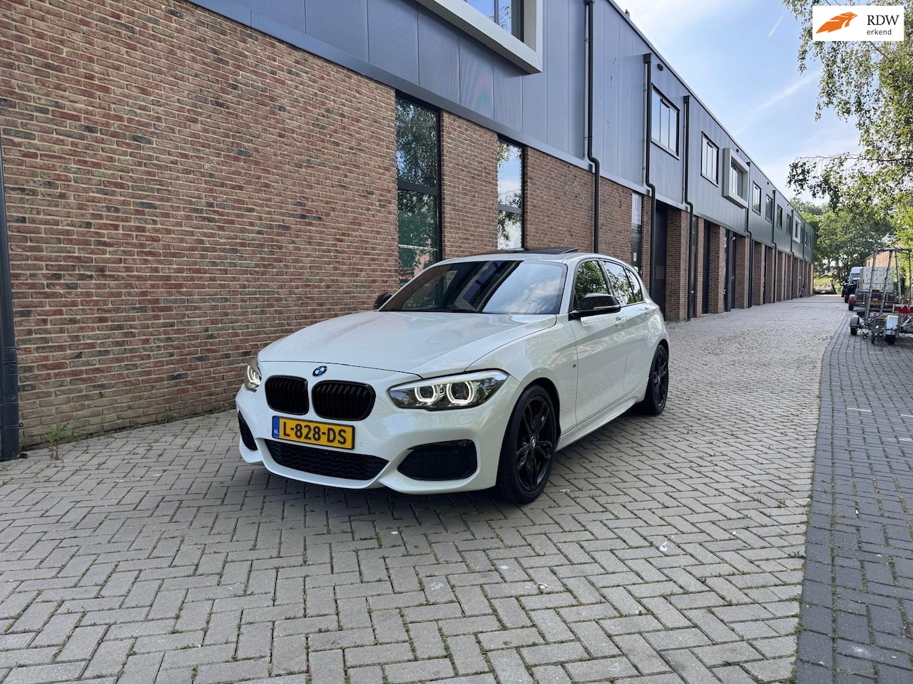 BMW 1-serie - BMW M135i AUTOMAAT | M-SPORT | SCHUIF-/KANTELDAK | NAVI PROFESSIONAL | KEYLESS ENTRY | MEM - AutoWereld.nl