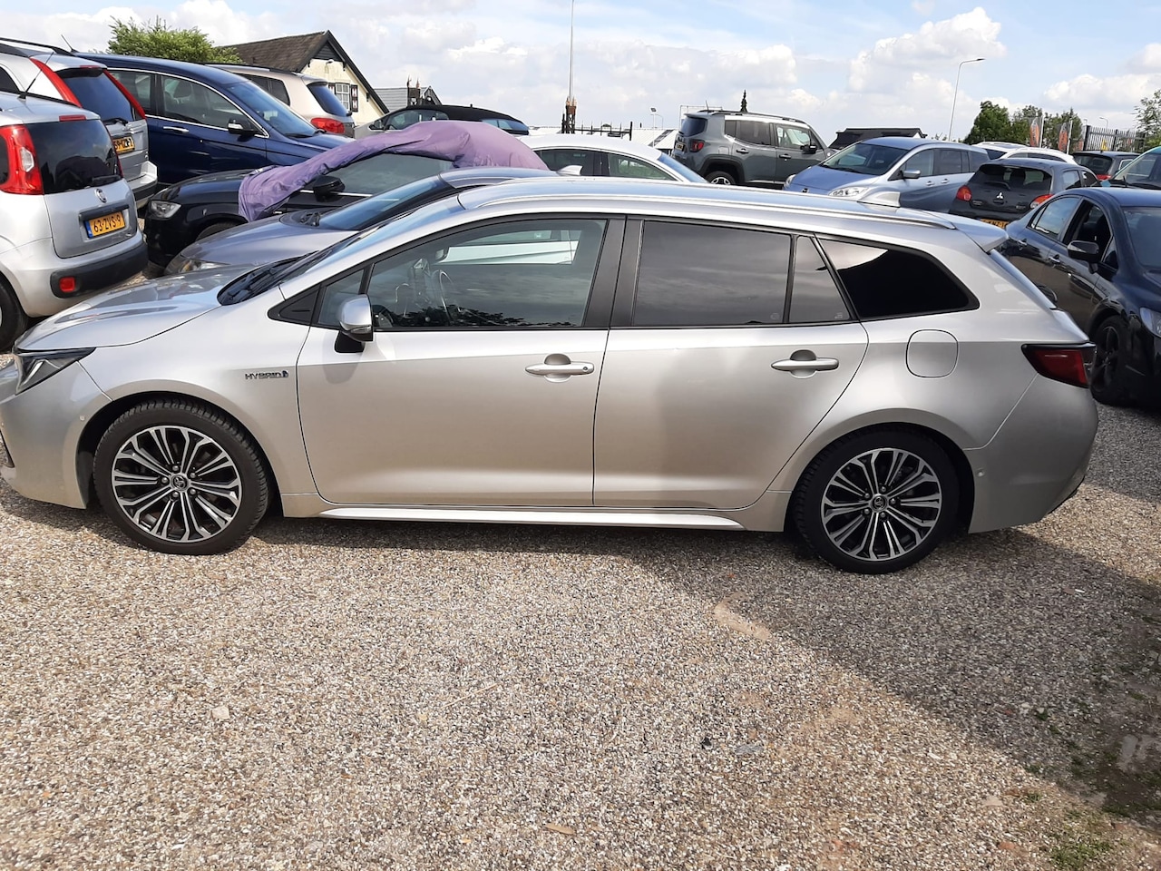 Toyota Corolla Touring Sports - 1.8 Hybrid Business Intro NAP Vol Option Nieuwe Banden - AutoWereld.nl