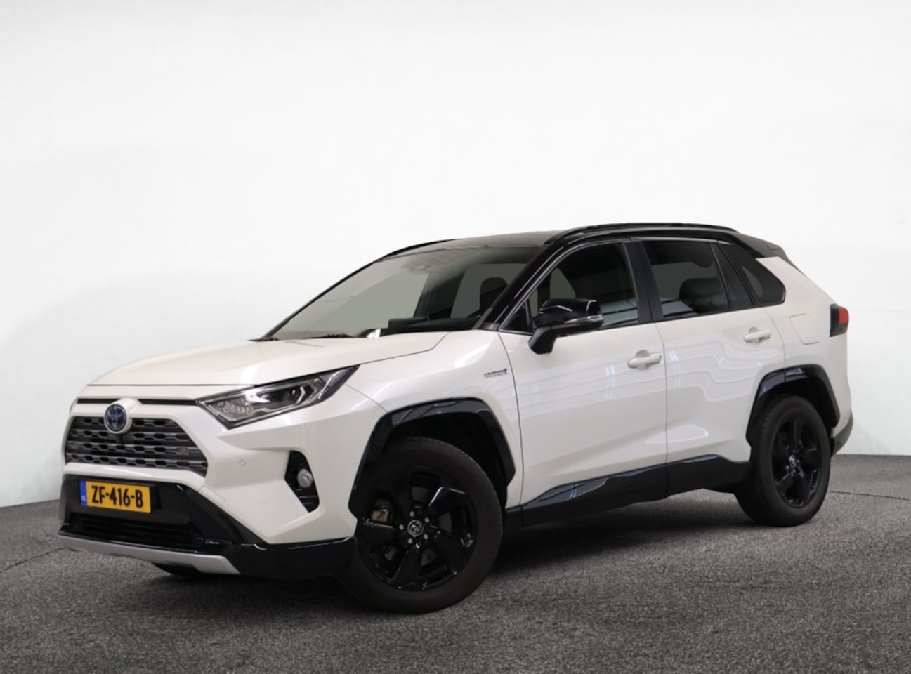 Toyota RAV4 - 2.5 Hybrid AWD Bi-Tone | Innovation-pakket | Panodak | - AutoWereld.nl