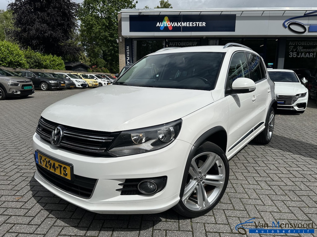 Volkswagen Tiguan - 1.4 TSI 150PK Sport&Style R-Line pakket Climate|Cruise|CarPlay|Trekhaak - AutoWereld.nl