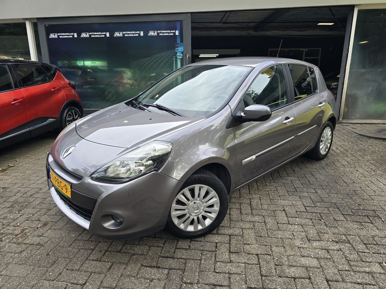 Renault Clio - 1.2 Collection | 2E EIGENAAR | NL AUTO | LAGE KM | NAVI | AIRCO | CRUISE | LMV | - AutoWereld.nl