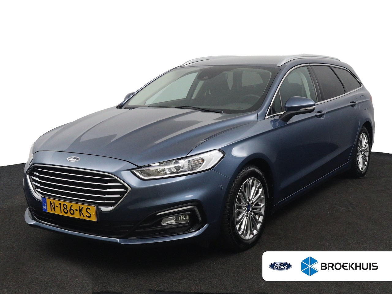 Ford Mondeo Wagon - 2.0 IVCT HEV Titanium | Camera | Privacy Glass | Navigatie | Cruise Control | Stoelverwarm - AutoWereld.nl