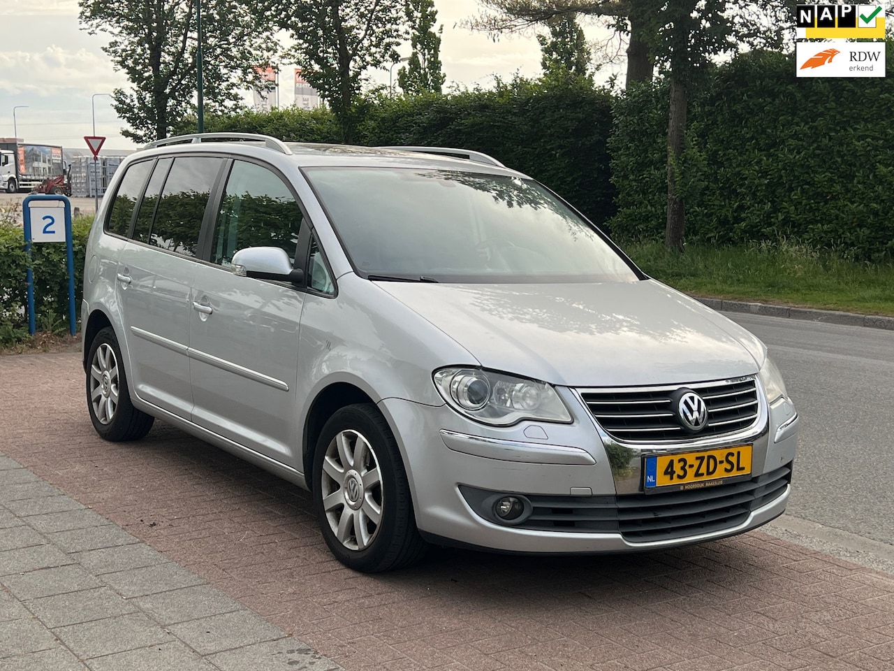 Volkswagen Touran - 1.4 TSI Highline *Navi|Leder|Trekhaak - AutoWereld.nl