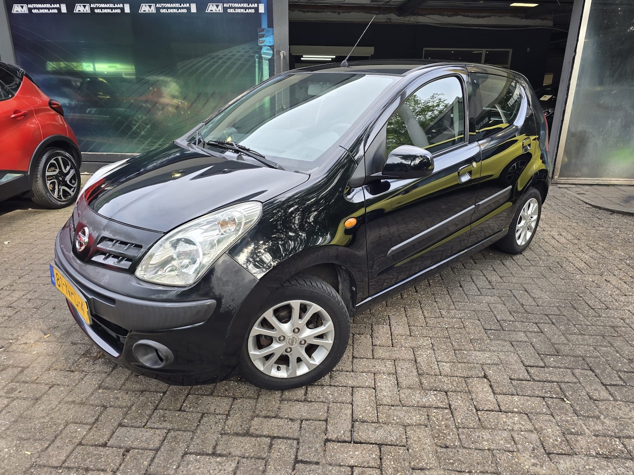Nissan Pixo - 1.0 Acenta | 2E EIGENAAR | 12MND GARANTE | AIRCO | LAGE KM | NIEUWE APK | - AutoWereld.nl