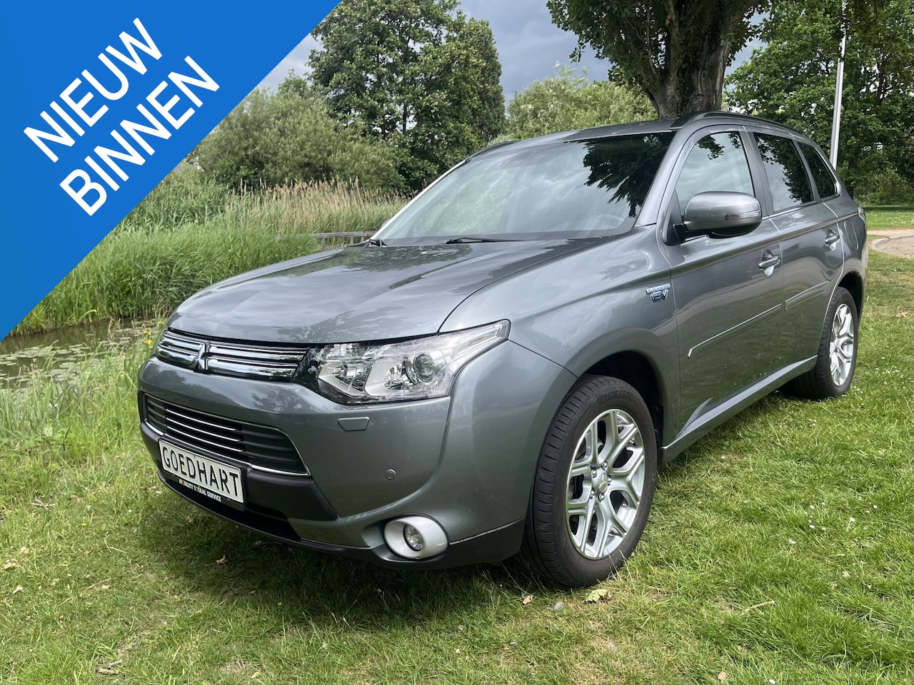 Mitsubishi Outlander - 2.0L PHEV 4WD 5pl. Safety Pack Topstaat - AutoWereld.nl