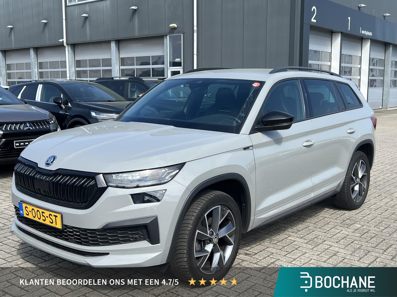 Skoda Kodiaq - 1.5 TSI Sportline Business 7p. | 7 persoons | Camera | Navigatie | Carplay | Trekhaak - AutoWereld.nl