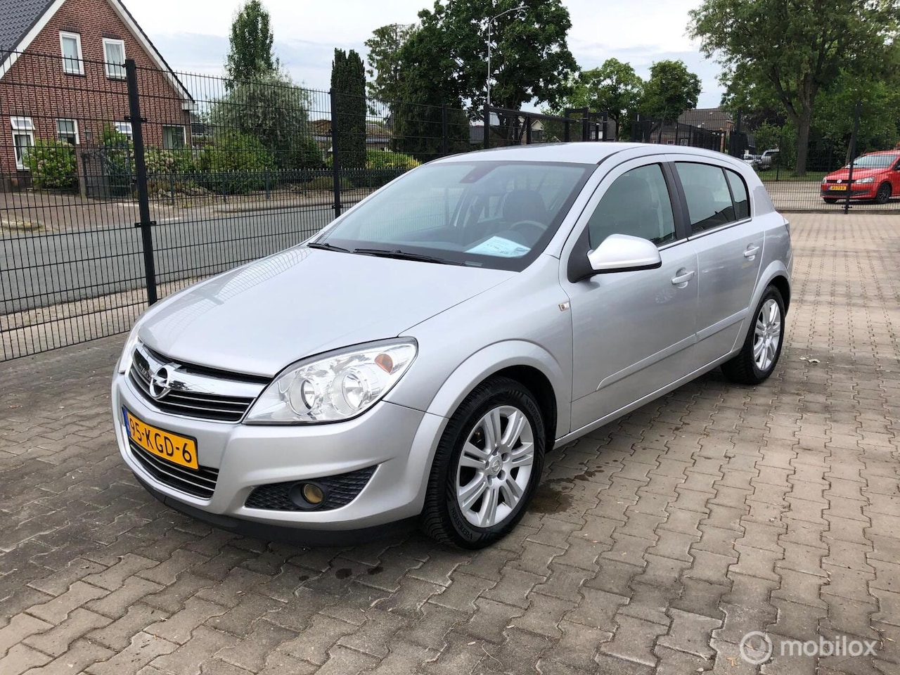 Opel Astra - 1.6 Cosmo Leder Airco Navi Trh - AutoWereld.nl