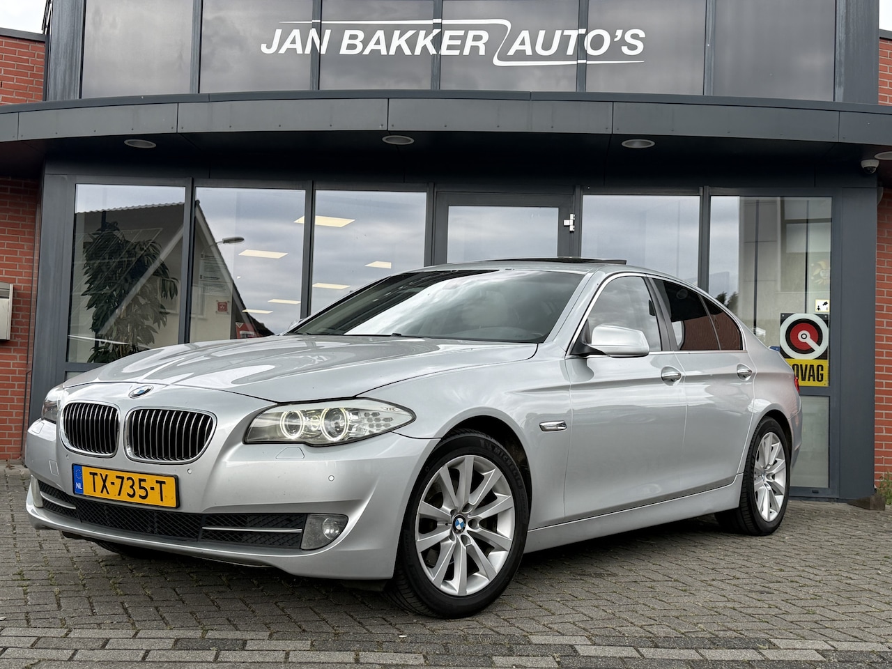 BMW 5-serie - 523i High Executive ✅ Camera ✅ Leer ✅ Schuifdak ✅ - AutoWereld.nl