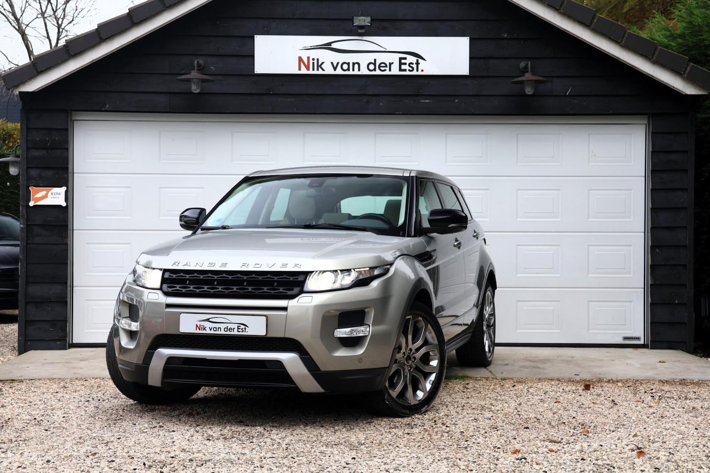 Land Rover Range Rover Evoque - 2.0 Si 4WD Prestige Dynamic-Dak-Stoelverwarming-Trekhaak-Meridian - AutoWereld.nl