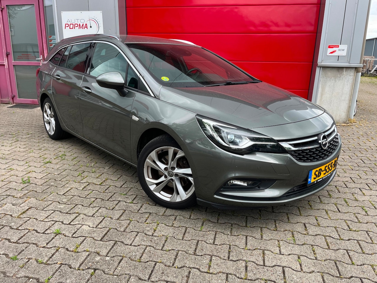 Opel Astra Sports Tourer - 1.6 CDTI 136pk Innovation / EXPORT /Trekhaak / Sportstoelen/ Stuur- en stoelverw. / 17" LM - AutoWereld.nl
