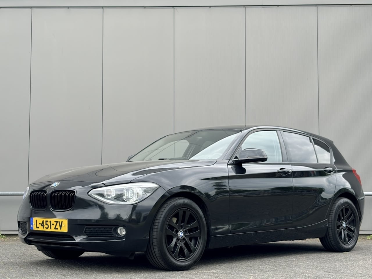 BMW 1-serie - 116i - Apple CarPlay - xenon - cruise - airco - trekhaak - - AutoWereld.nl